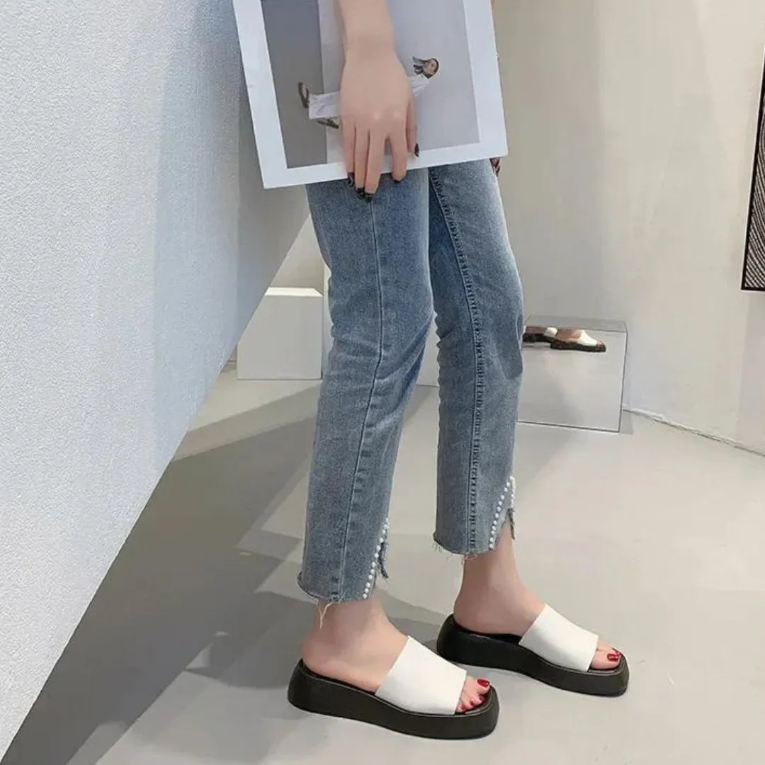 Minimalist slide sandals with a wide strap