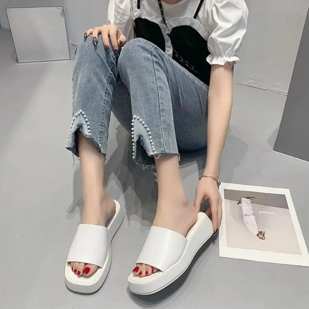 Minimalist slide sandals with a wide strap