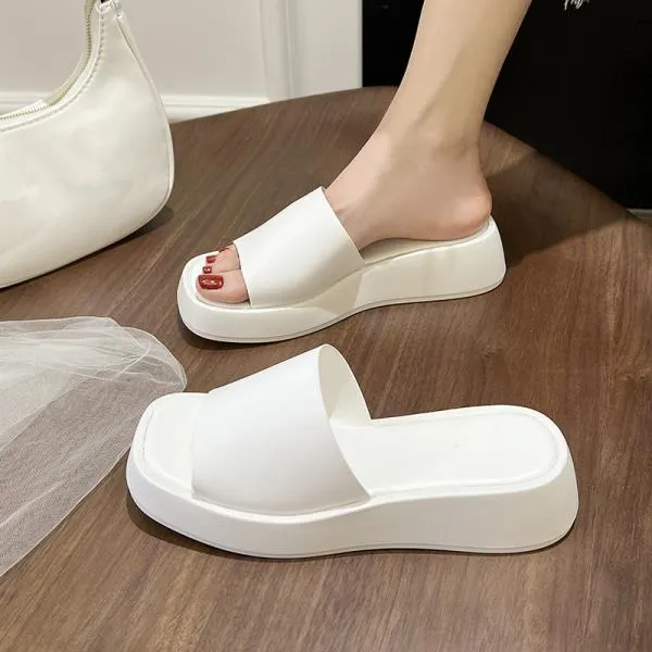 Minimalist slide sandals with a wide strap