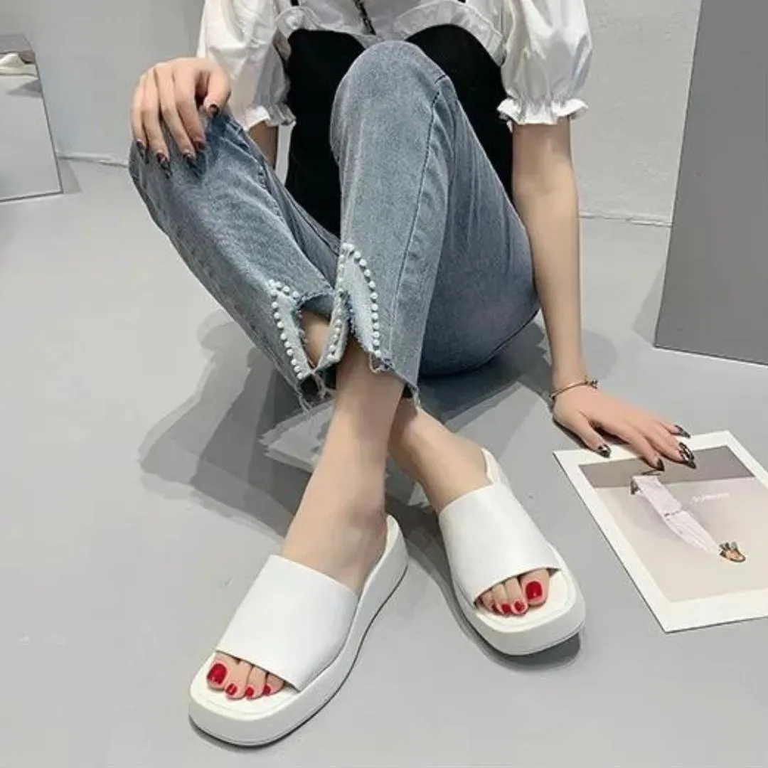 Minimalist slide sandals with a wide strap