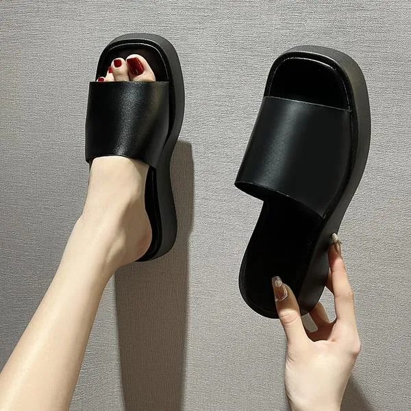 Minimalist slide sandals with a wide strap