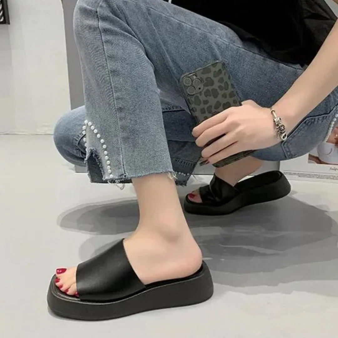 Minimalist slide sandals with a wide strap