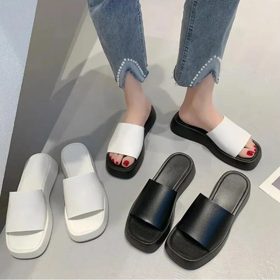Minimalist slide sandals with a wide strap