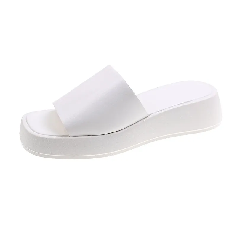 Minimalist slide sandals with a wide strap