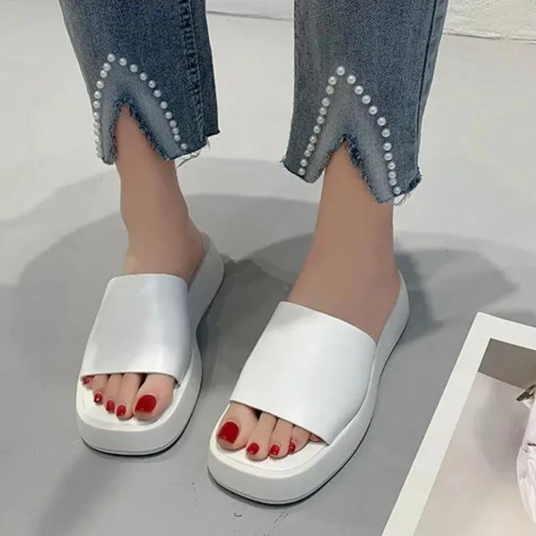 Minimalist slide sandals with a wide strap