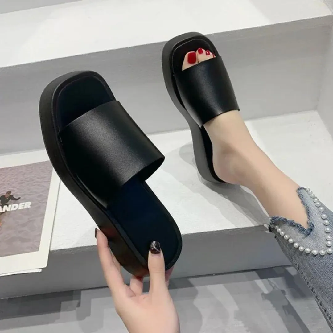Minimalist slide sandals with a wide strap