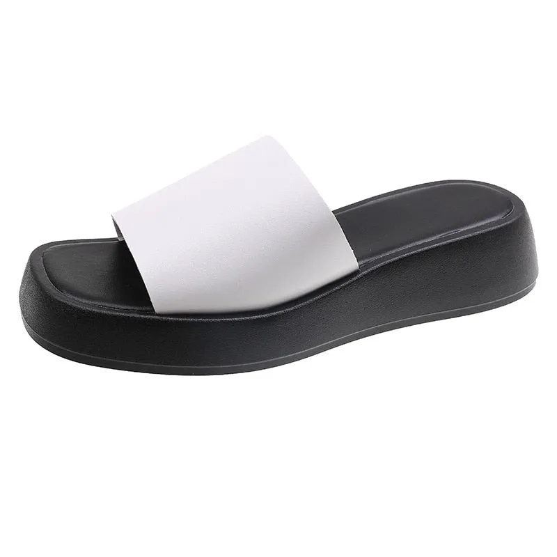 Minimalist slide sandals with a wide strap